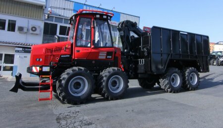 Hitraf entrega A Mariña Lucence.  Komatsu 845 con adaptación de caja de carga para eucalipto descortezado.