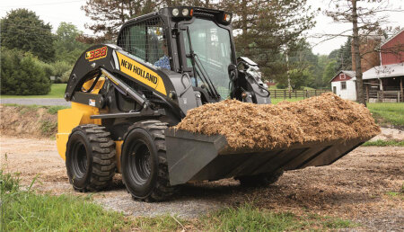 New Holland celebra 50 años de su oferta de Mini cargadoras